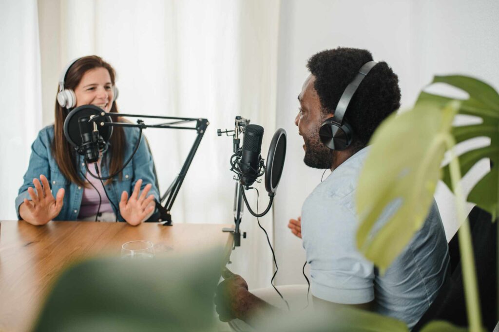 diverse-colleagues-recording-podcast-and-talking-i-RVVA4ED.jpg